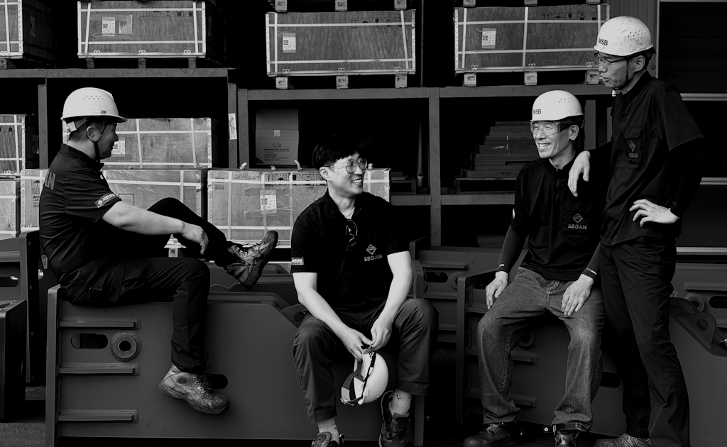 SEOAN team members in the factory